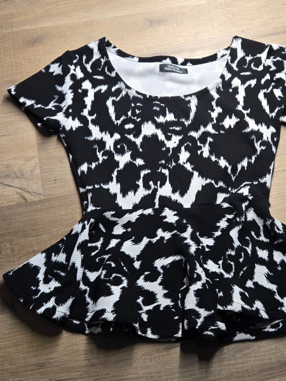 Peplum top made by small independent designer.